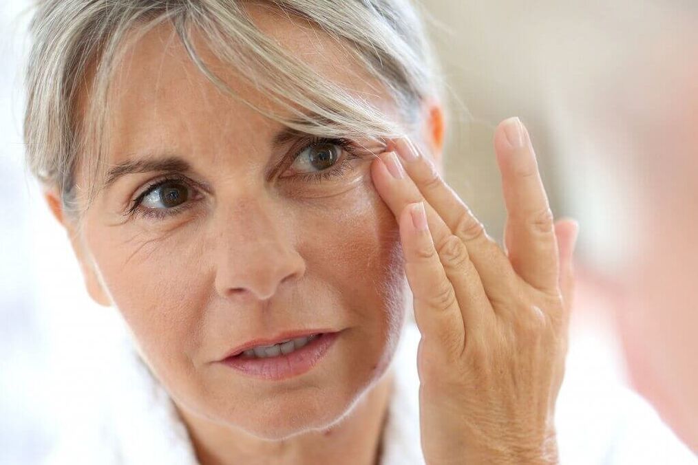 woman rejuvenating the skin around the eyes