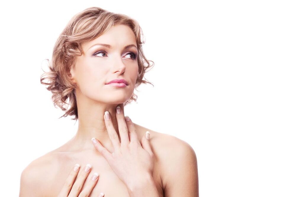 The girl has smooth skin on her neck and chest area after the rejuvenation process